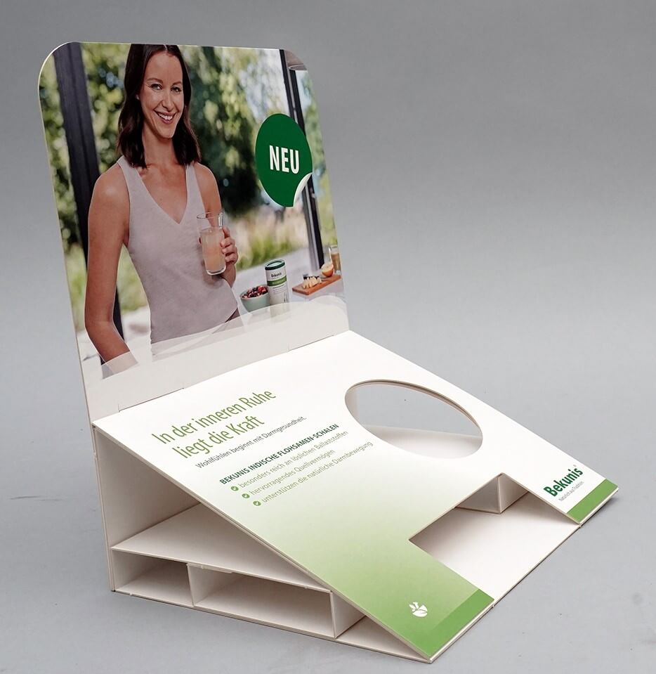 Klappdisplay mit Aussparung für eine Dose mit Flohsamenschalen von pod GmbH für Bekunis