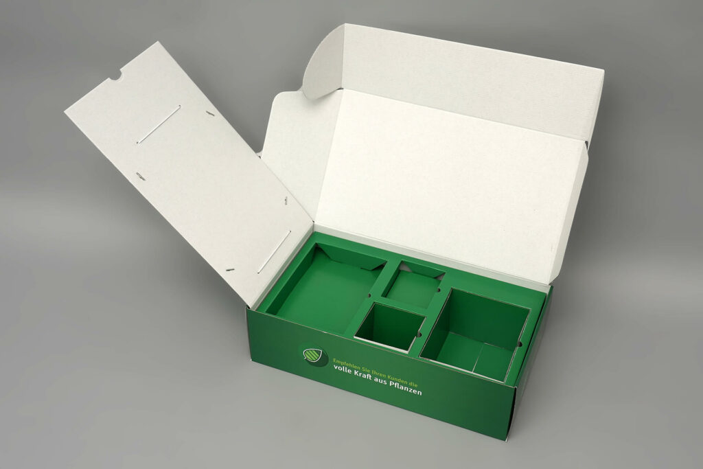 Verpackung für Mailing mit verschieden großen inneren Fächern von pod GmbH